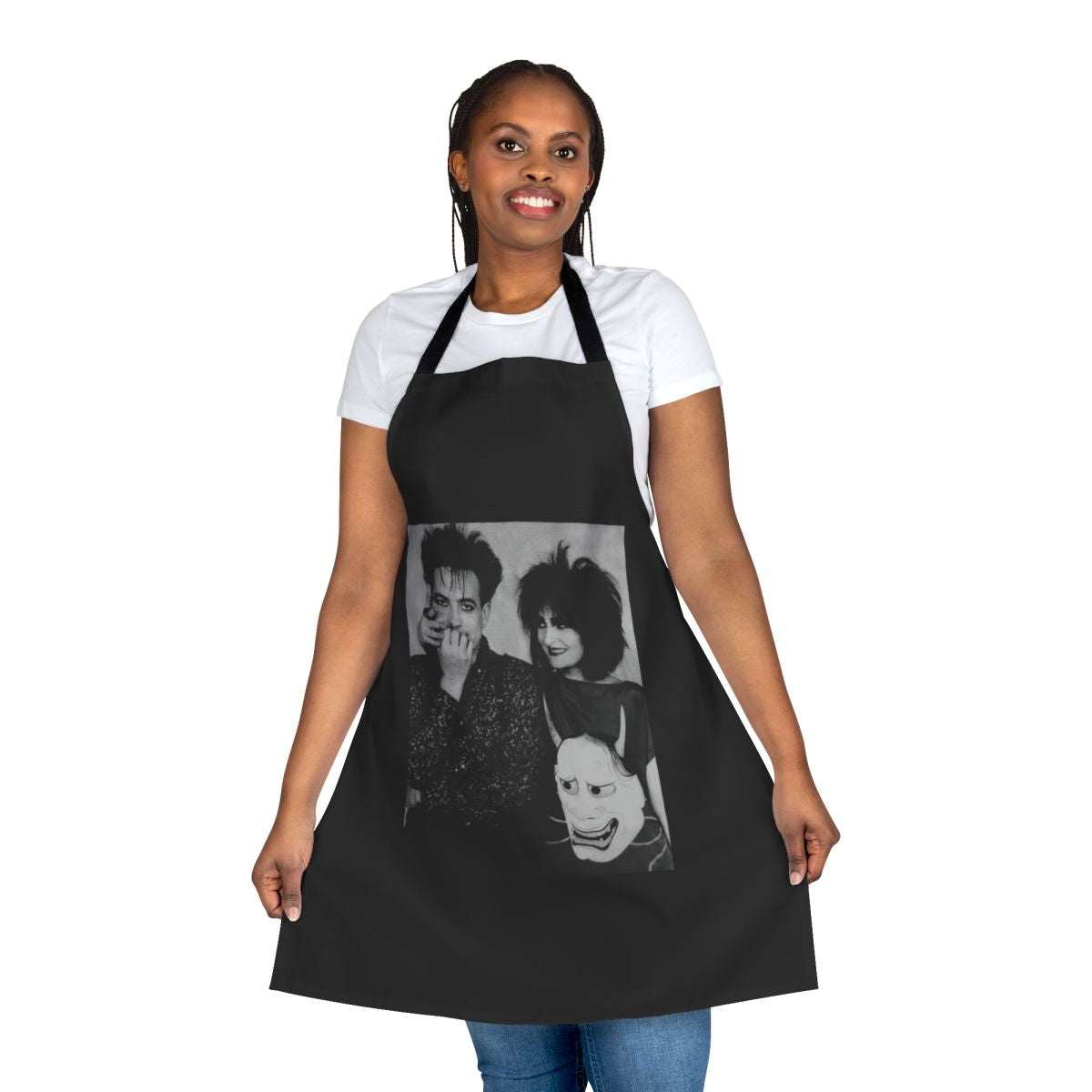 Apron featuring a stylized design with the names "Siouxsie Sioux" and "Robert Smith" against a dark background, representing 1980s alternative music.