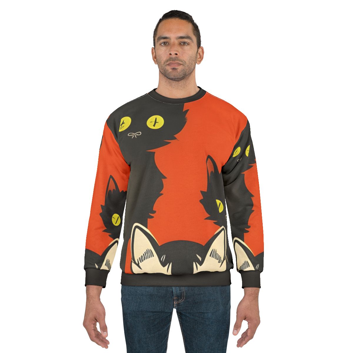 Curious cats wearing Halloween-themed clothing on a sweatshirt