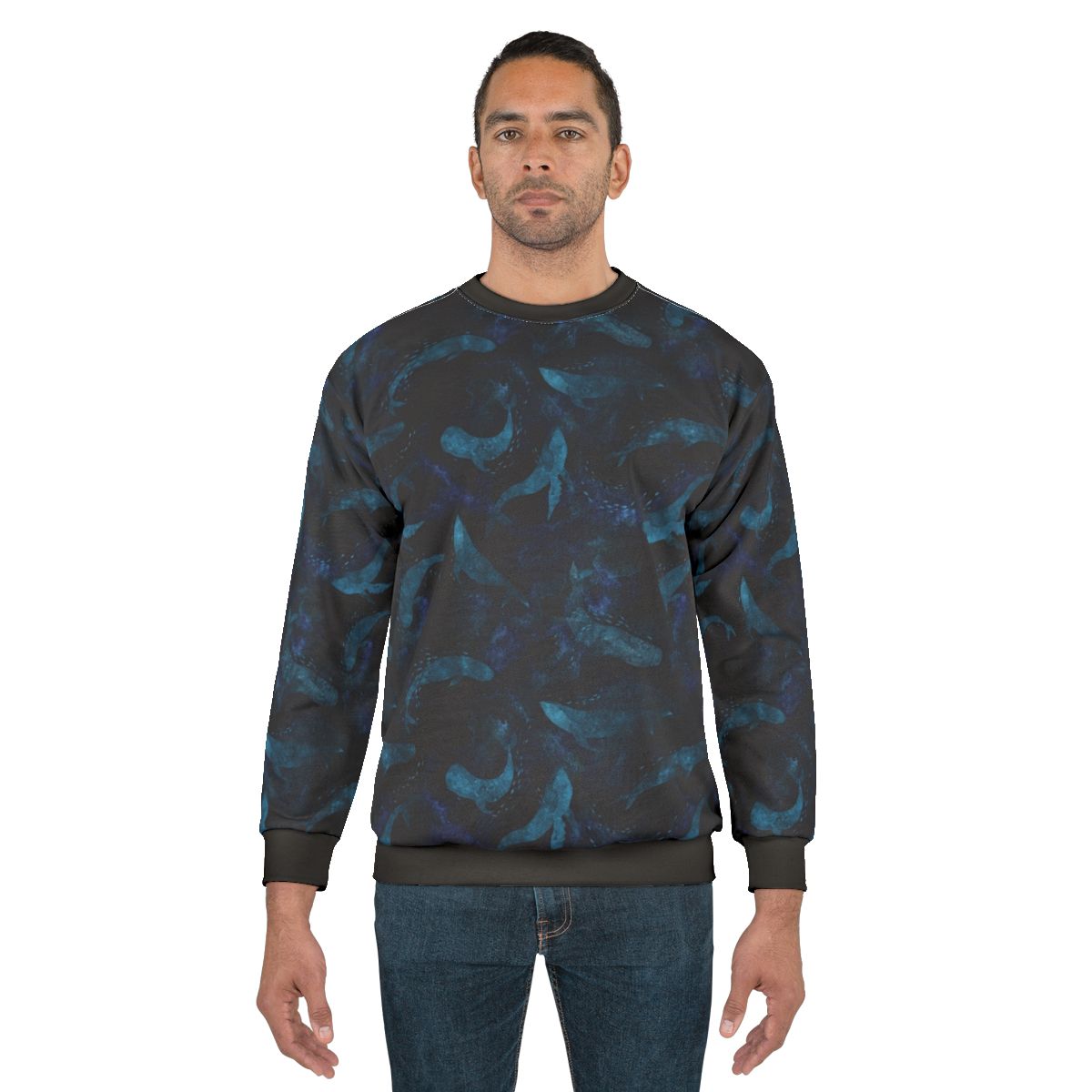 Indigo blue sweatshirt with a design of whales dancing underwater
