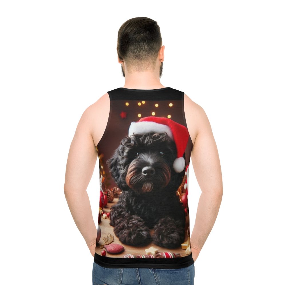 Black cockapoo wearing a santa hat design on a unisex tank top