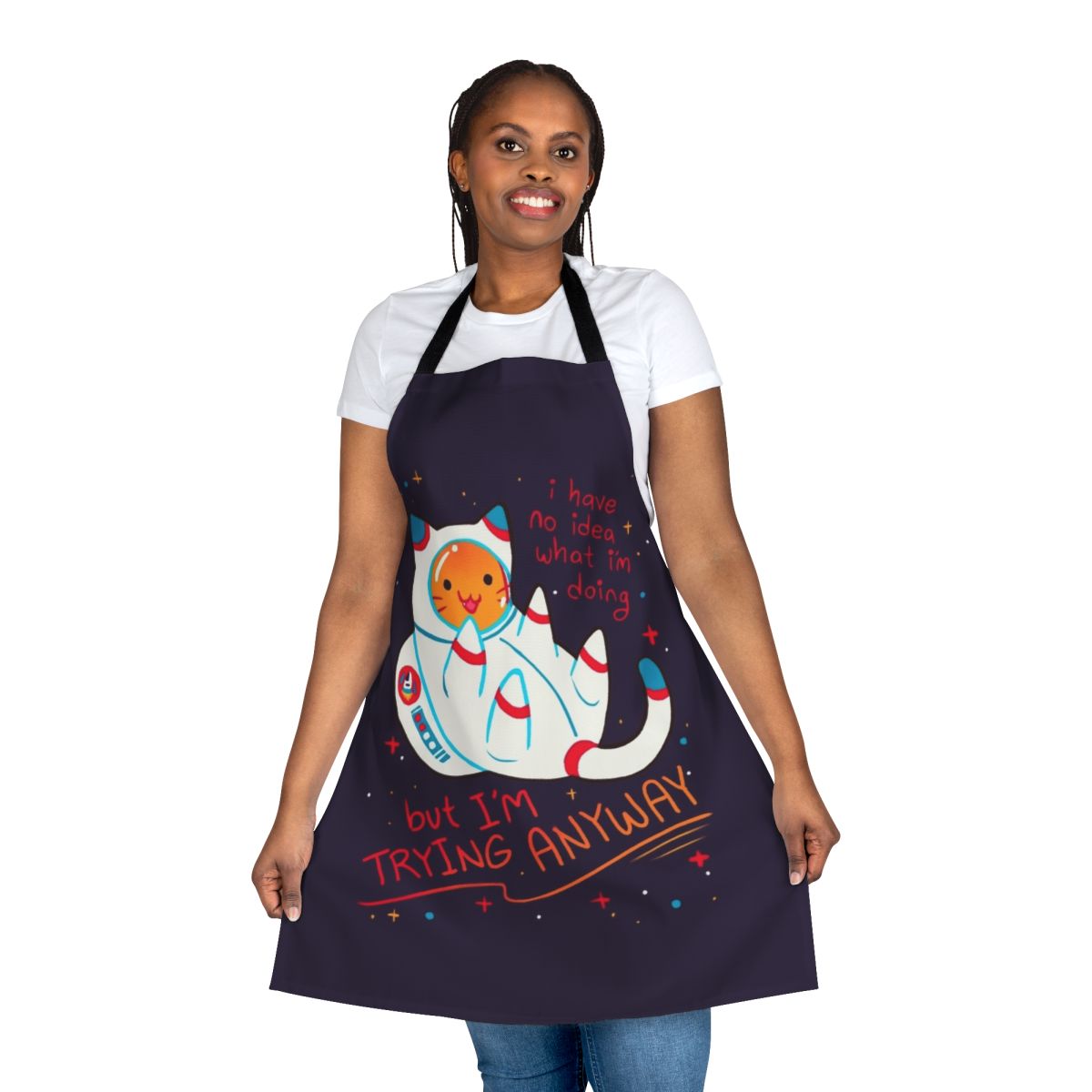 A stylish and inspirational apron featuring a cute cat astronaut design, perfect for cat lovers and space enthusiasts.