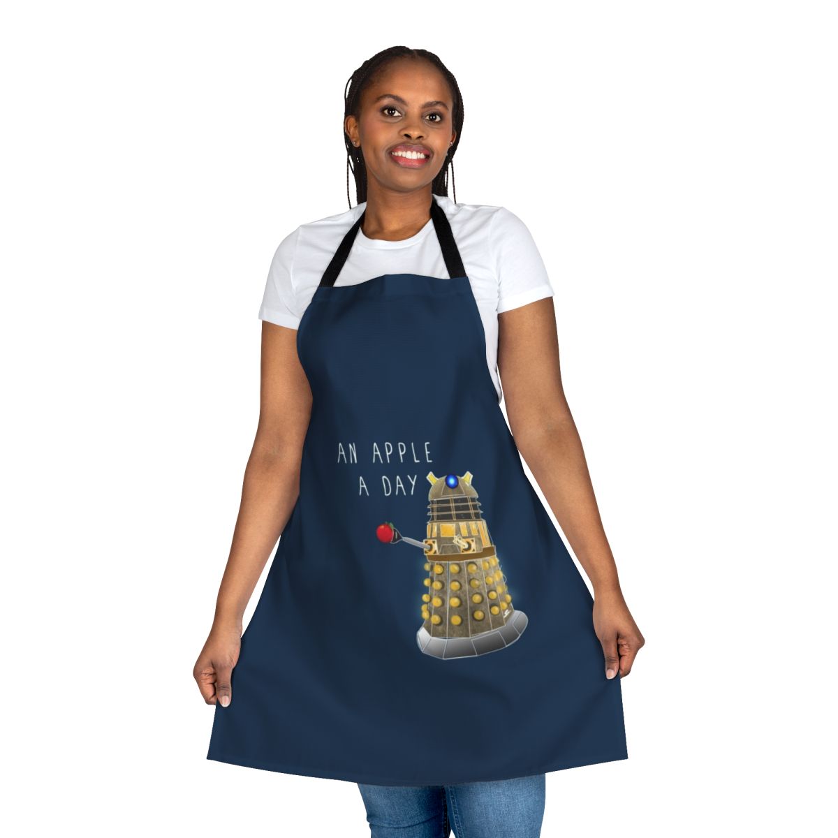 A quirky apron featuring an apple design and the phrase "An Apple a Day Keeps the Doctor Away"