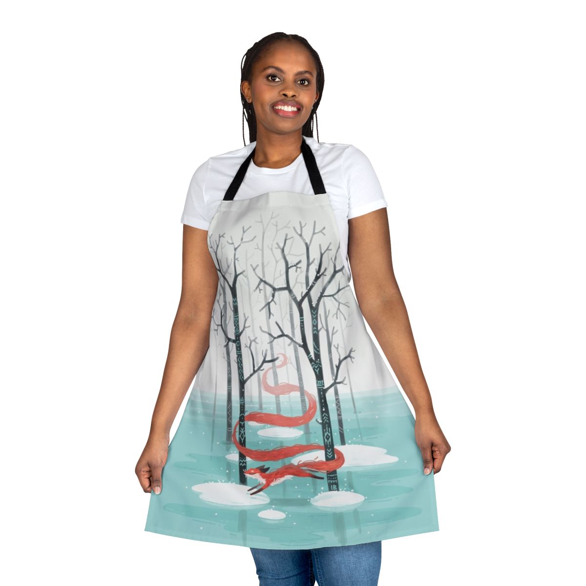 An apron featuring a whimsical forest spirit fox design in shades of blue, red, and white.