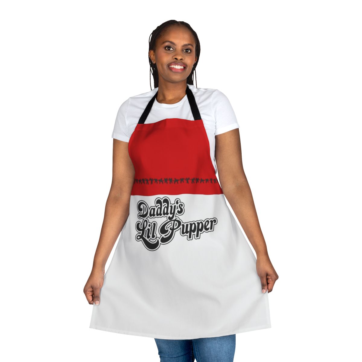 A black apron with the text "Daddy's Lil Pupper" in a fun, pop art style