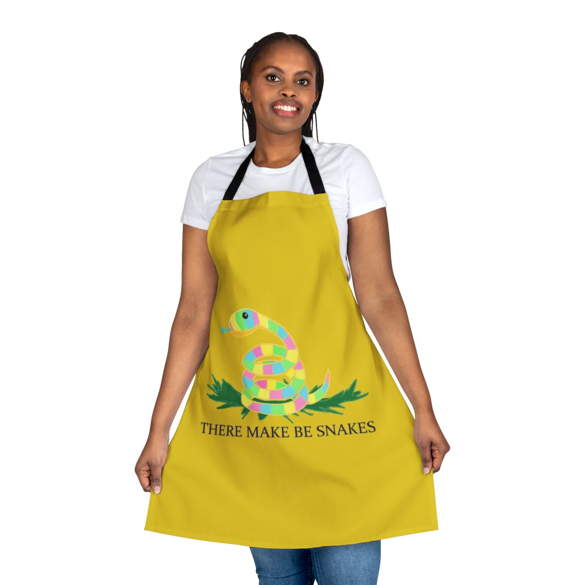 A black and white apron with a humorous "There May Be Snakes" design, perfect for the kitchen.