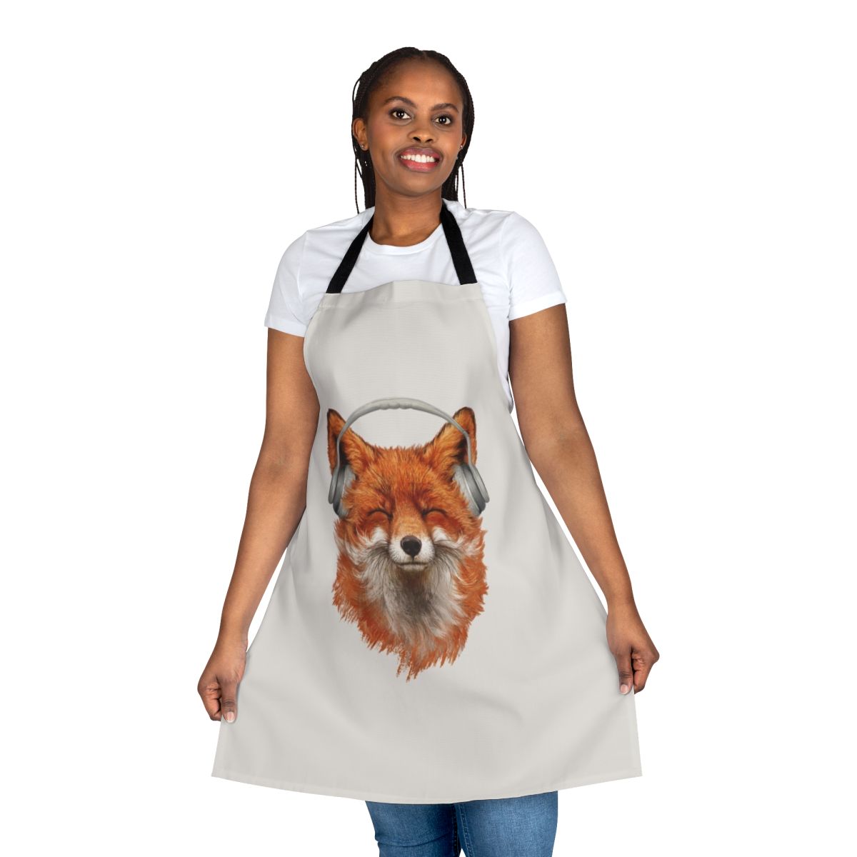 A whimsical apron featuring a smiling, musical fox with headphones.