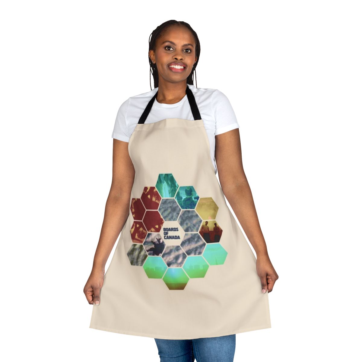 Turquoise and hexagon patterned apron with a sun motif, inspired by the music of Boards of Canada