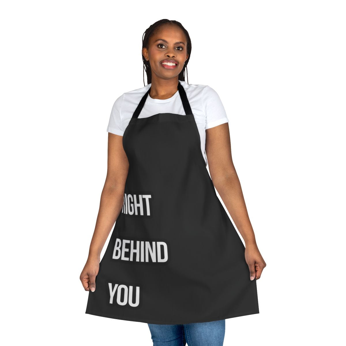 Person wearing a durable, high-quality chef apron in a restaurant kitchen