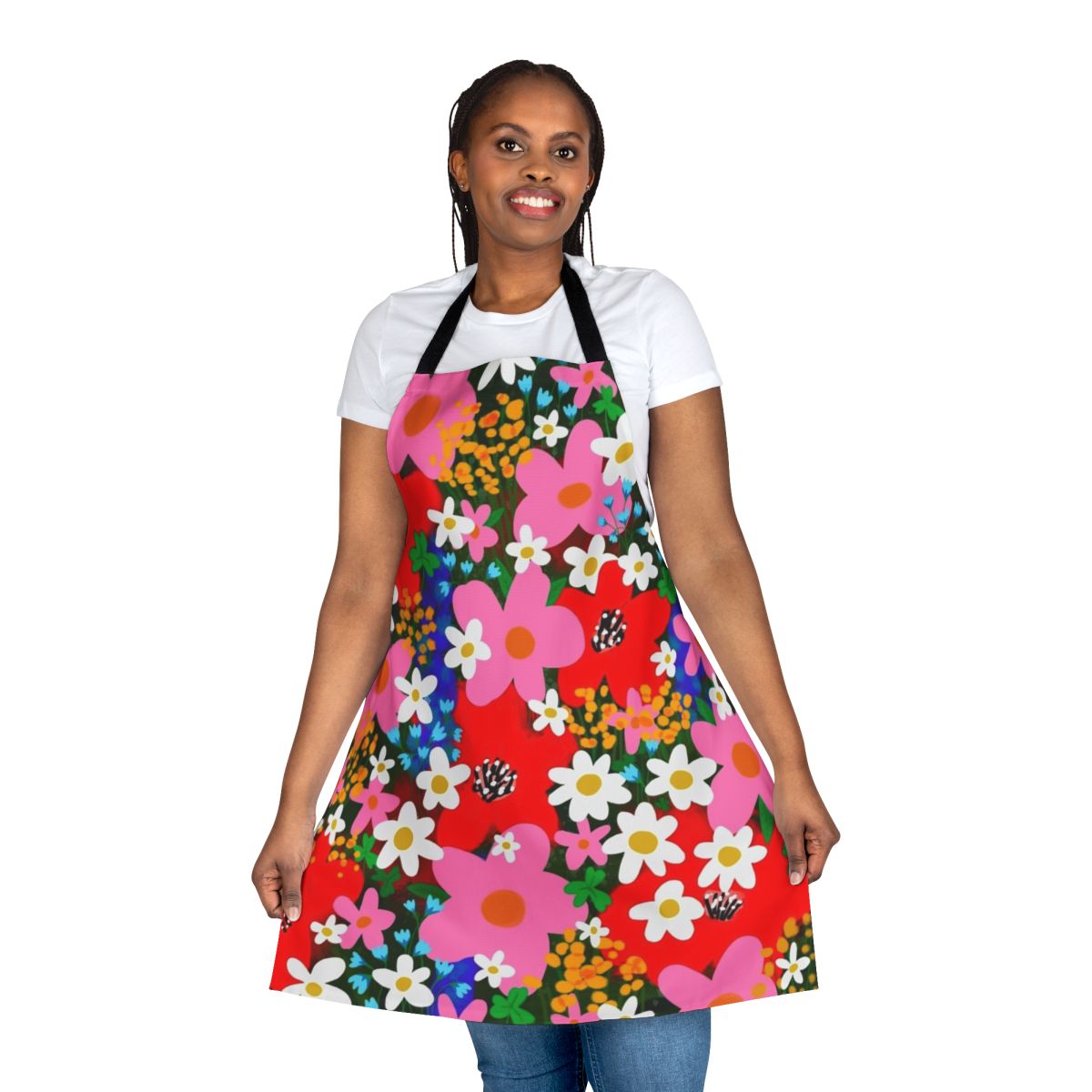 A vibrant, floral-patterned apron featuring daisies, poppies, and other blooms in a retro, 1960s-inspired design.