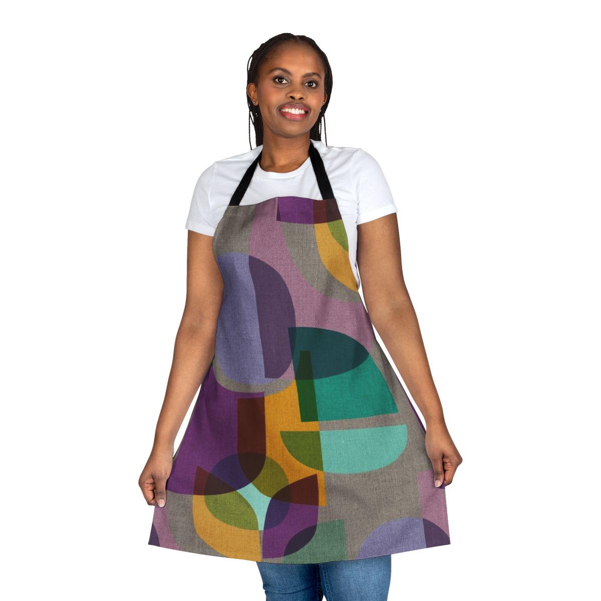 Colorful mid-century inspired apron with a kaleidoscope print design in shades of purple, lavender, and aqua.