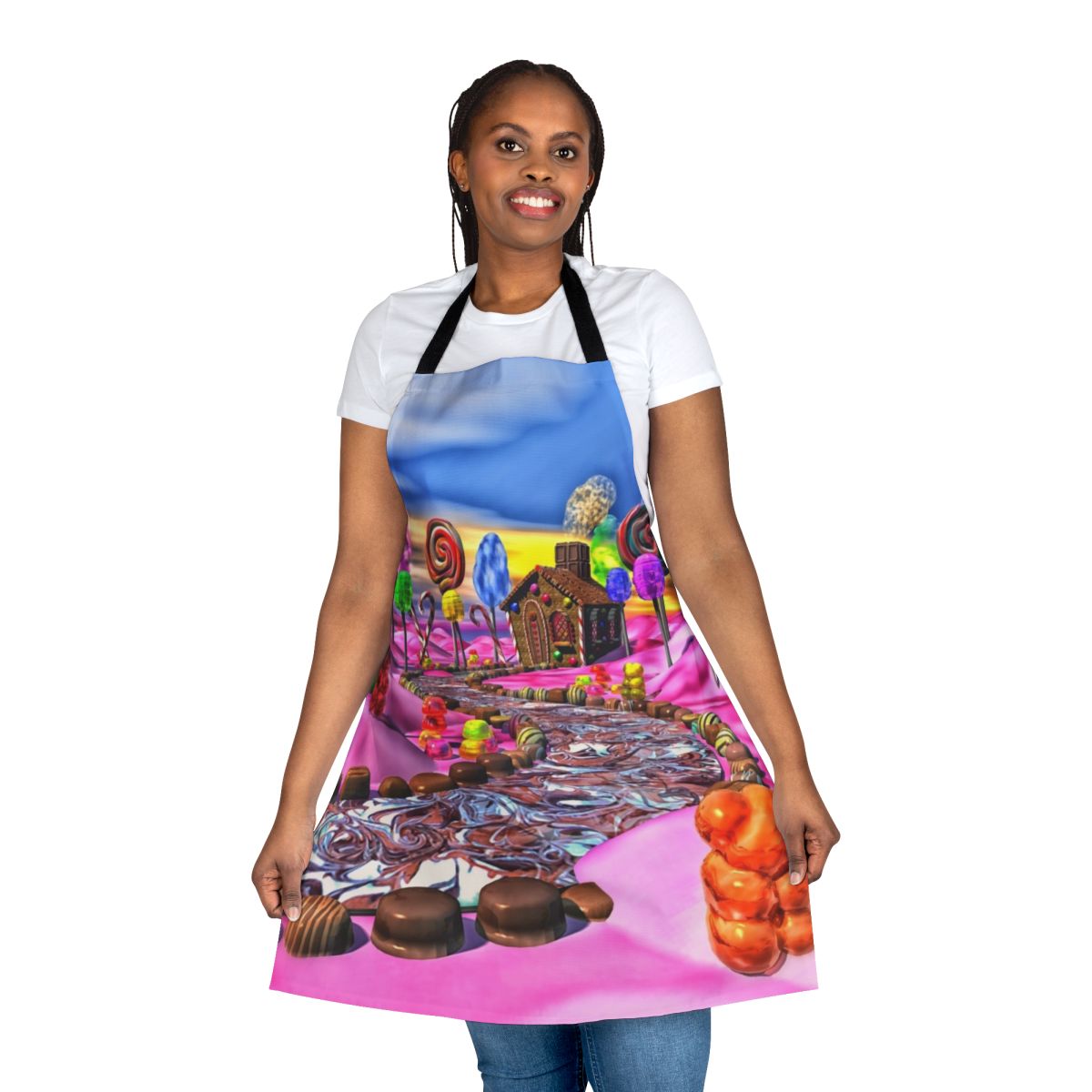 Colorful pink apron with candyland-inspired design featuring candy, gingerbread, and sweet treats
