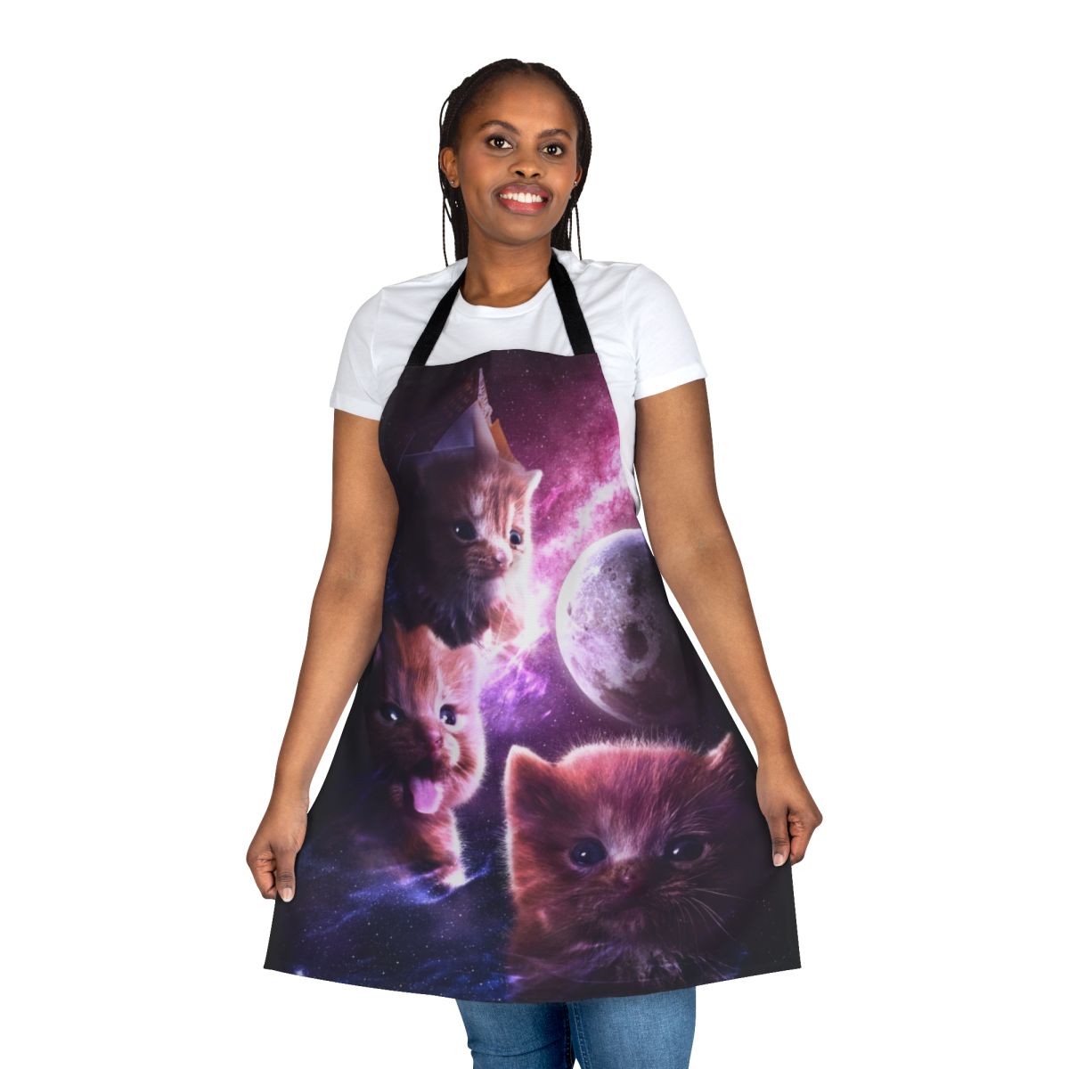 A whimsical apron featuring a three-degenerate moon design and an adorable ginger kitten