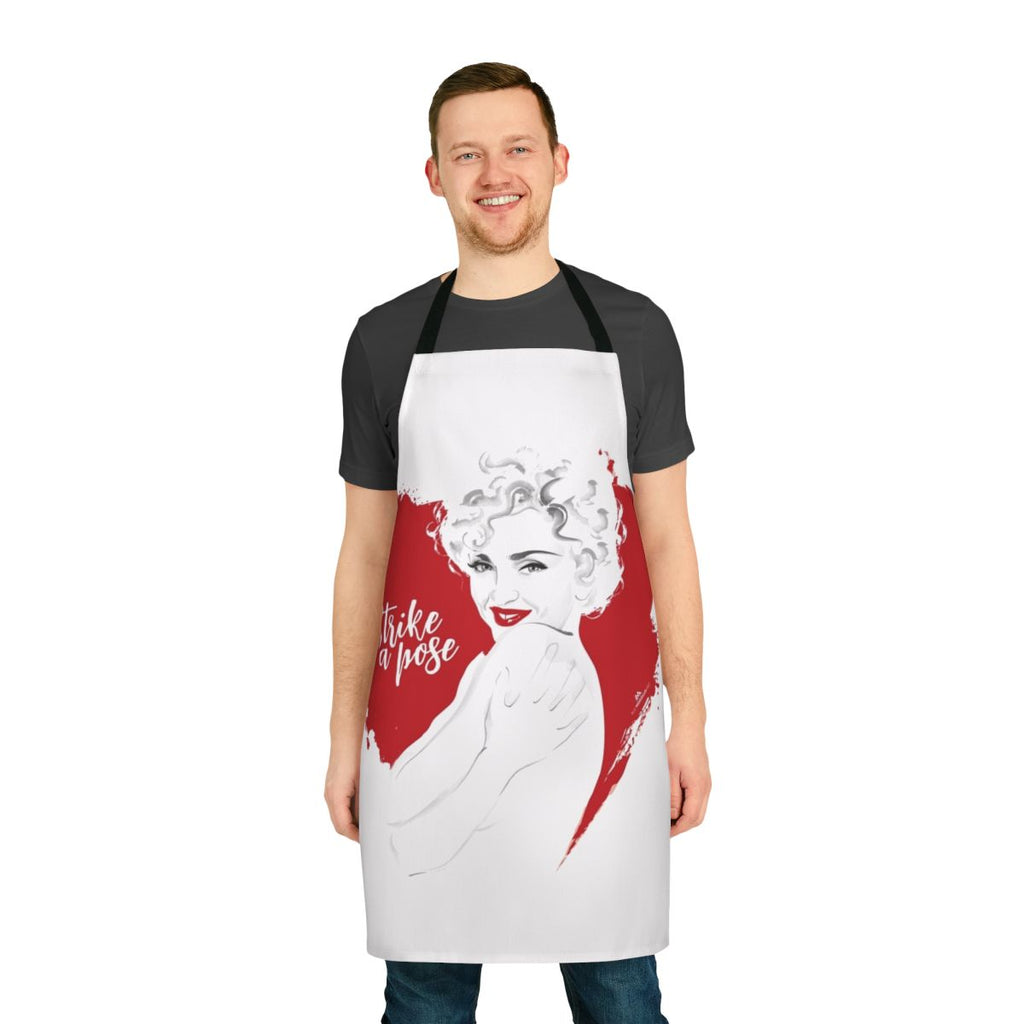A stylish apron featuring an iconic 90s dance pose, perfect for the musically ambitious home chef.