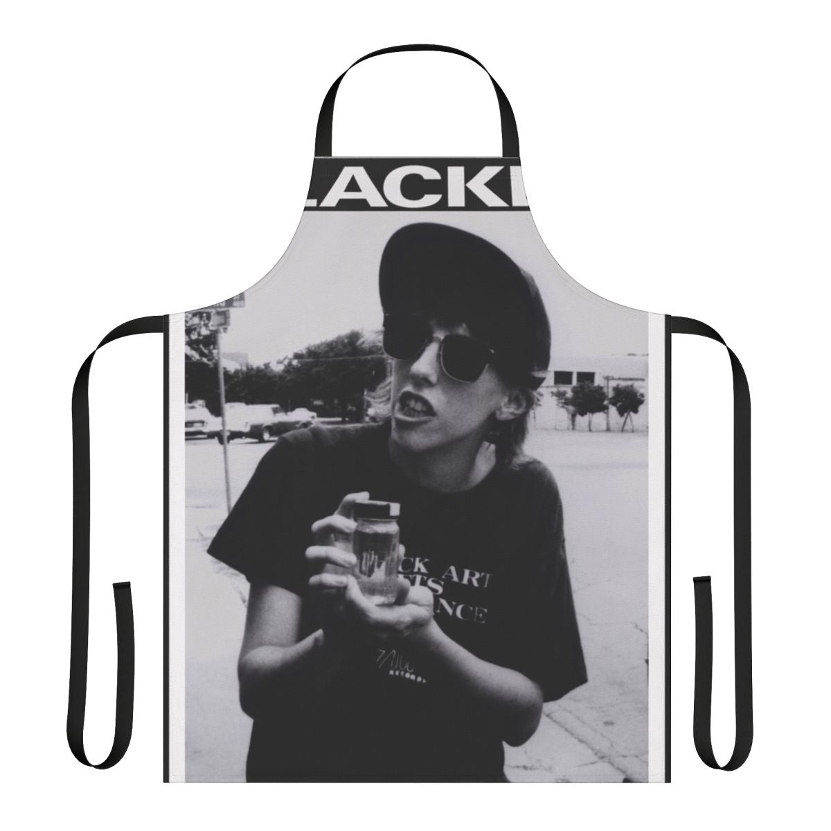 A retro-style apron with a slacker movie theme, featuring a cult cinema design
