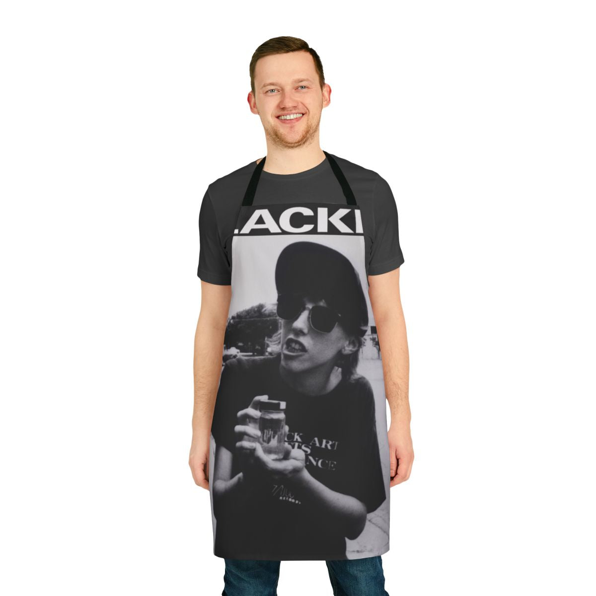 A retro-style apron with a slacker movie theme, featuring a cult cinema design