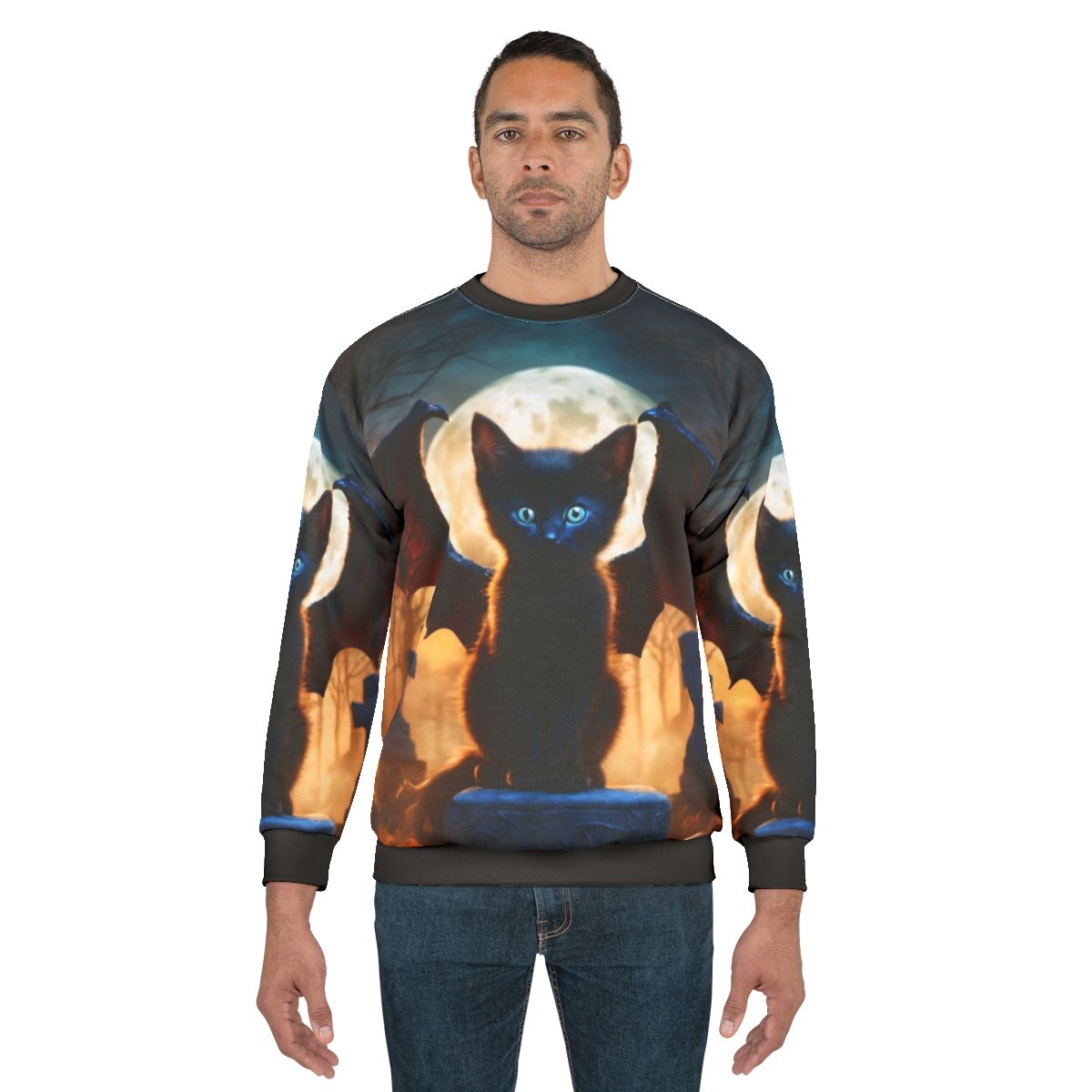 Black dragon kitten sitting in a graveyard on a sweatshirt