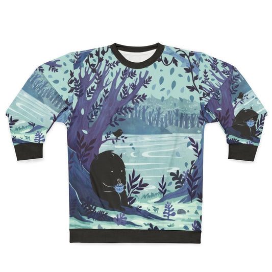 A cozy sweatshirt with a nature-inspired "A Quiet Spot of Tea" design