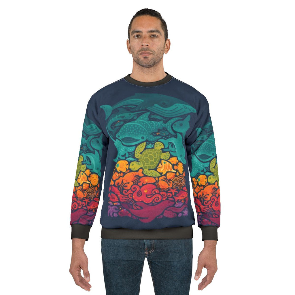 Colorful aquatic spectrum sweatshirt with underwater sea life design