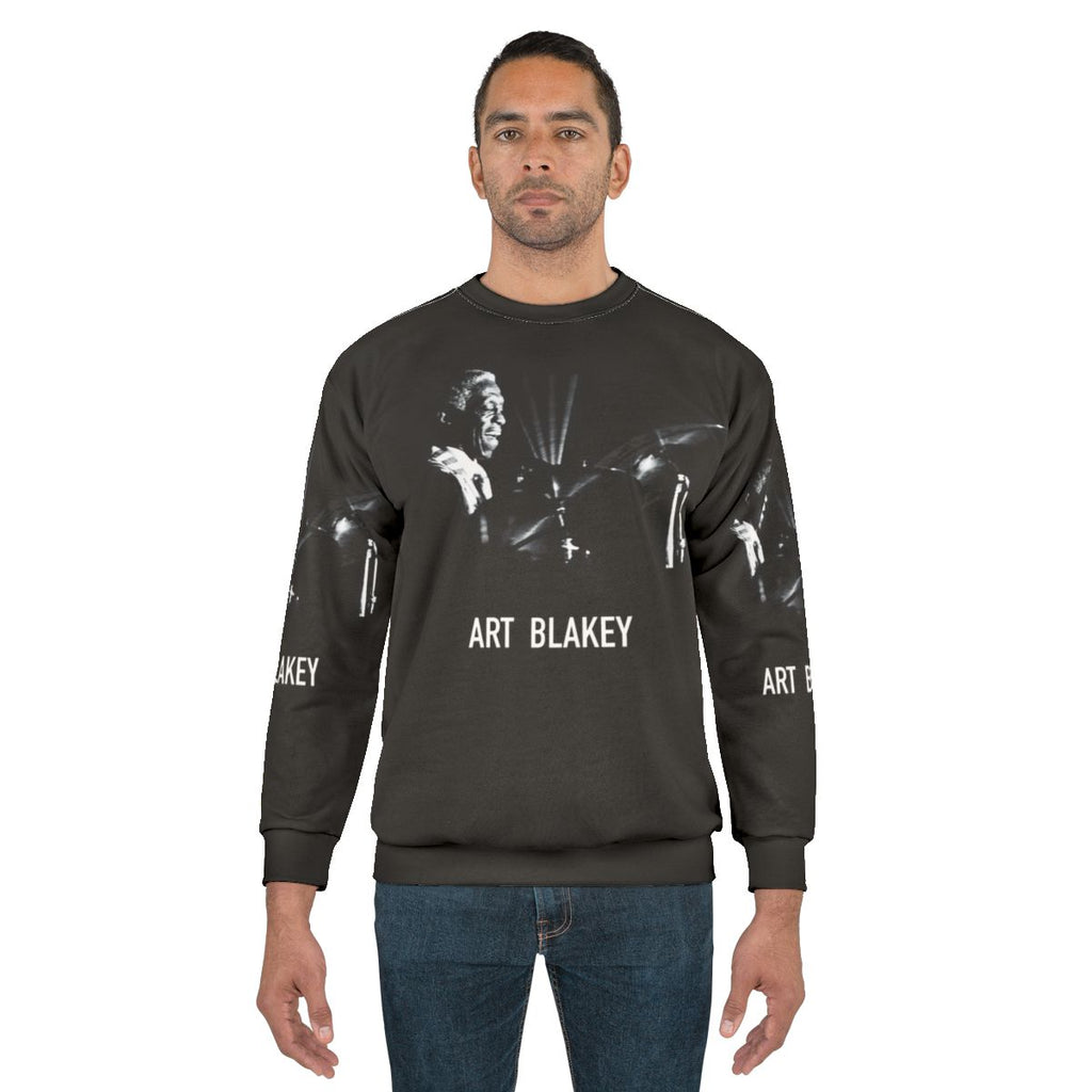 Art Blakey, legendary jazz drummer, on a stylish sweatshirt