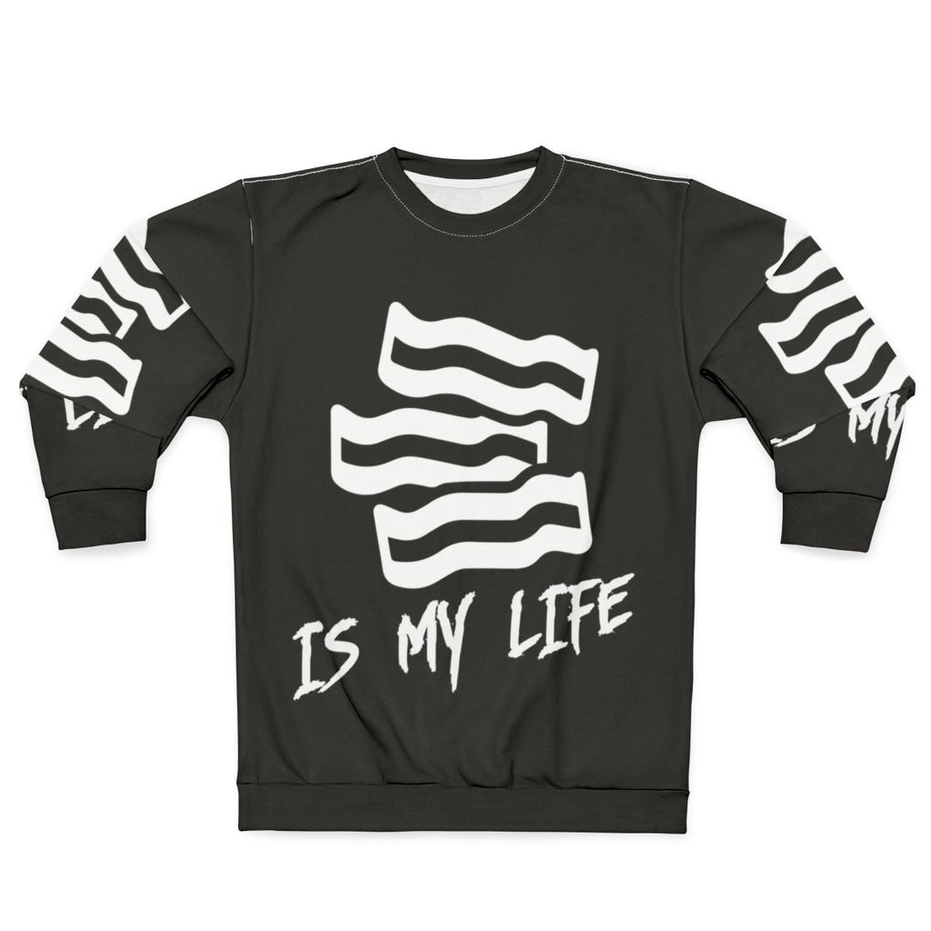 Bacon lover wearing a sweatshirt with "Bacon Is My Life" printed on it