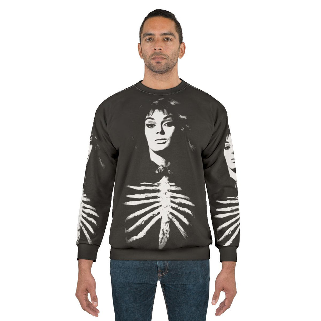 Barbara Steele as the "Queen of Horror" wearing a black and gothic-inspired sweatshirt