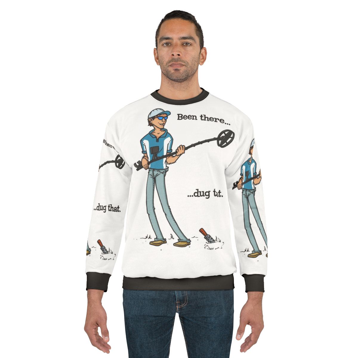 Metal detecting enthusiast wearing "Been There Dug That" sweatshirt