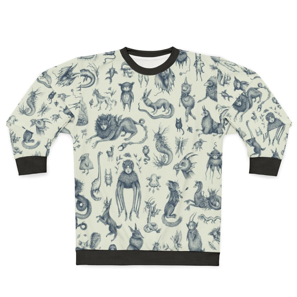 Sweatshirt with a pattern of mythical creatures like Bigfoot, Nessie, and dragons in a pastel, nature-inspired design