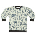 Sweatshirt with a pattern of mythical creatures like Bigfoot, Nessie, and dragons in a pastel, nature-inspired design