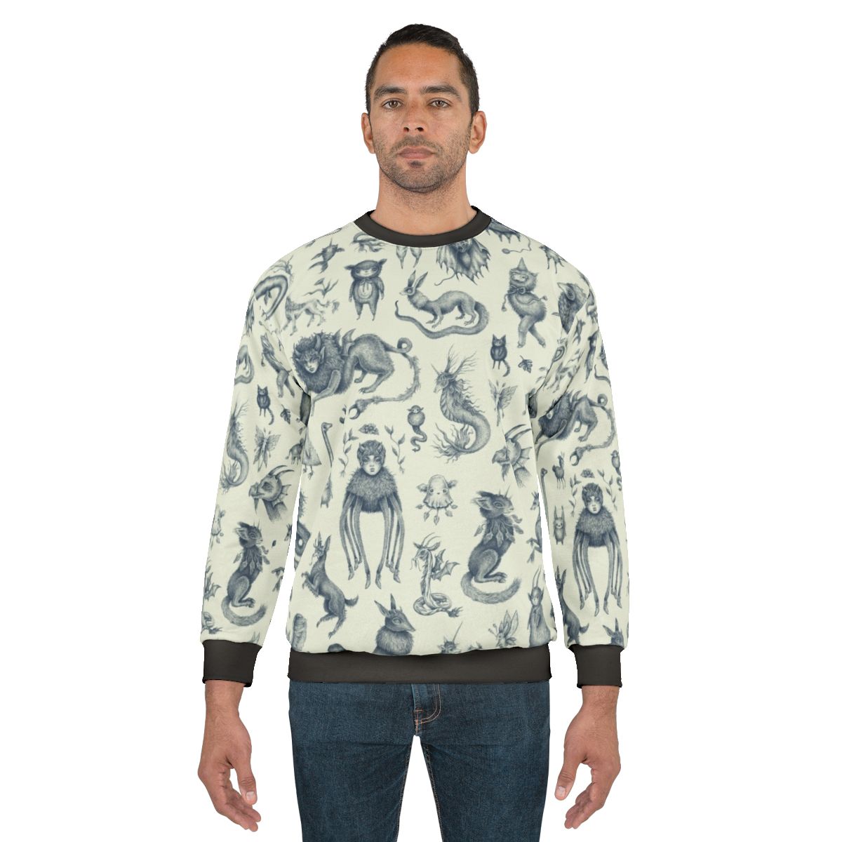 Sweatshirt with a pattern of mythical creatures like Bigfoot, Nessie, and dragons in a pastel, nature-inspired design