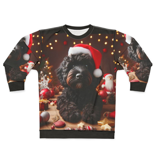 Black cockapoo dog wearing a Santa hat on a Christmas sweatshirt