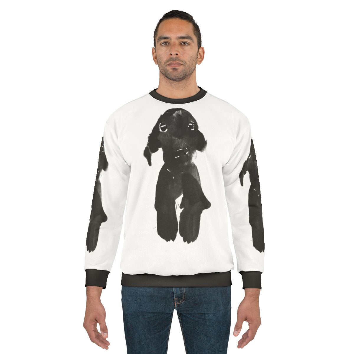 Black dog wearing a cozy sweatshirt