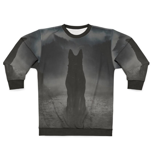 A black German shepherd dog silhouette in the foggy night