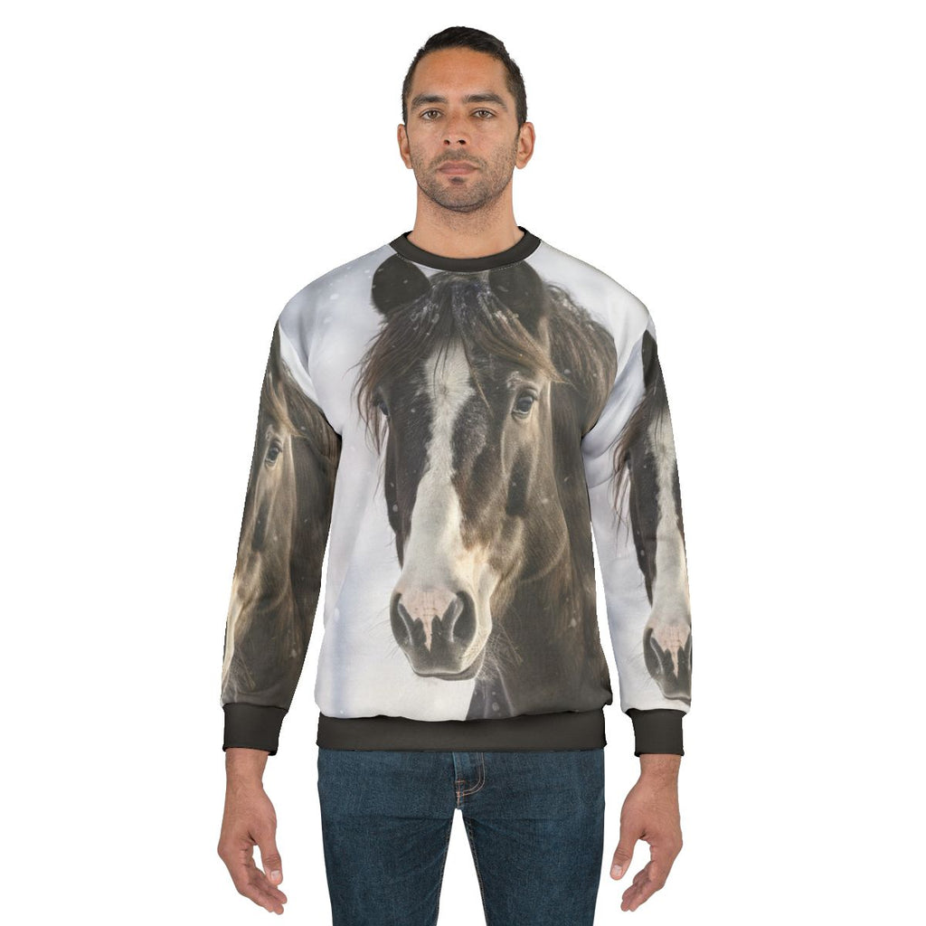 Black horse silhouette in winter scene on sweatshirt