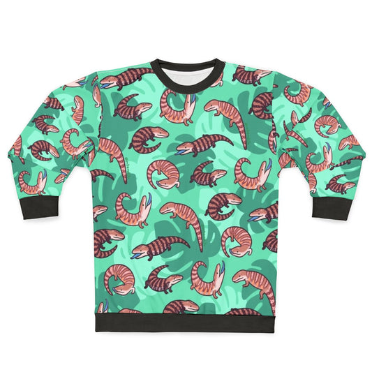 Vibrant blue tongue skink illustration on a cozy sweatshirt