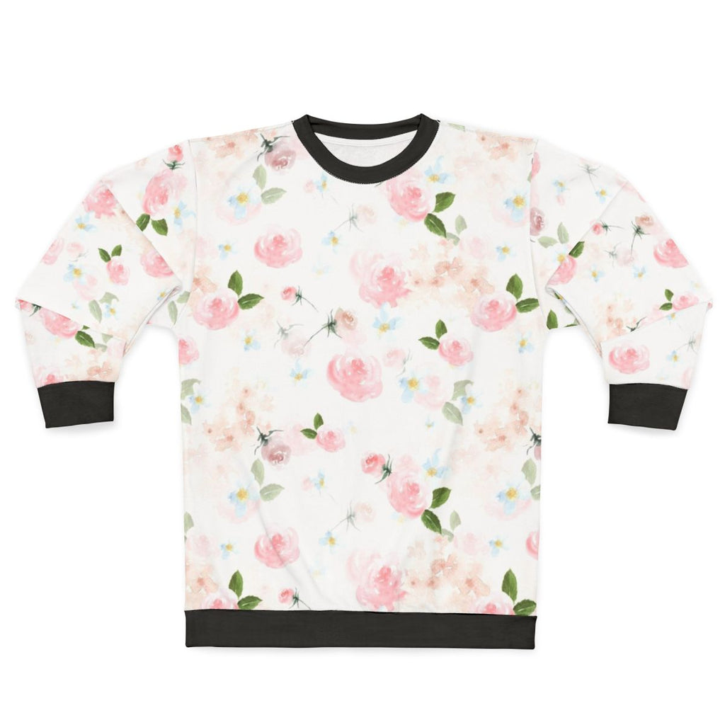 Botanical watercolor floral print on a pink sweatshirt