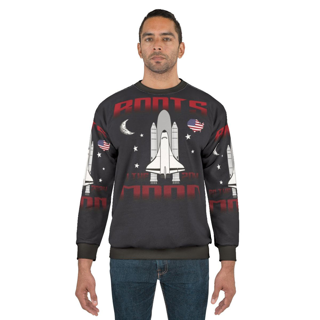 Boots on the Moon Sweatshirt featuring a humorous space-themed design