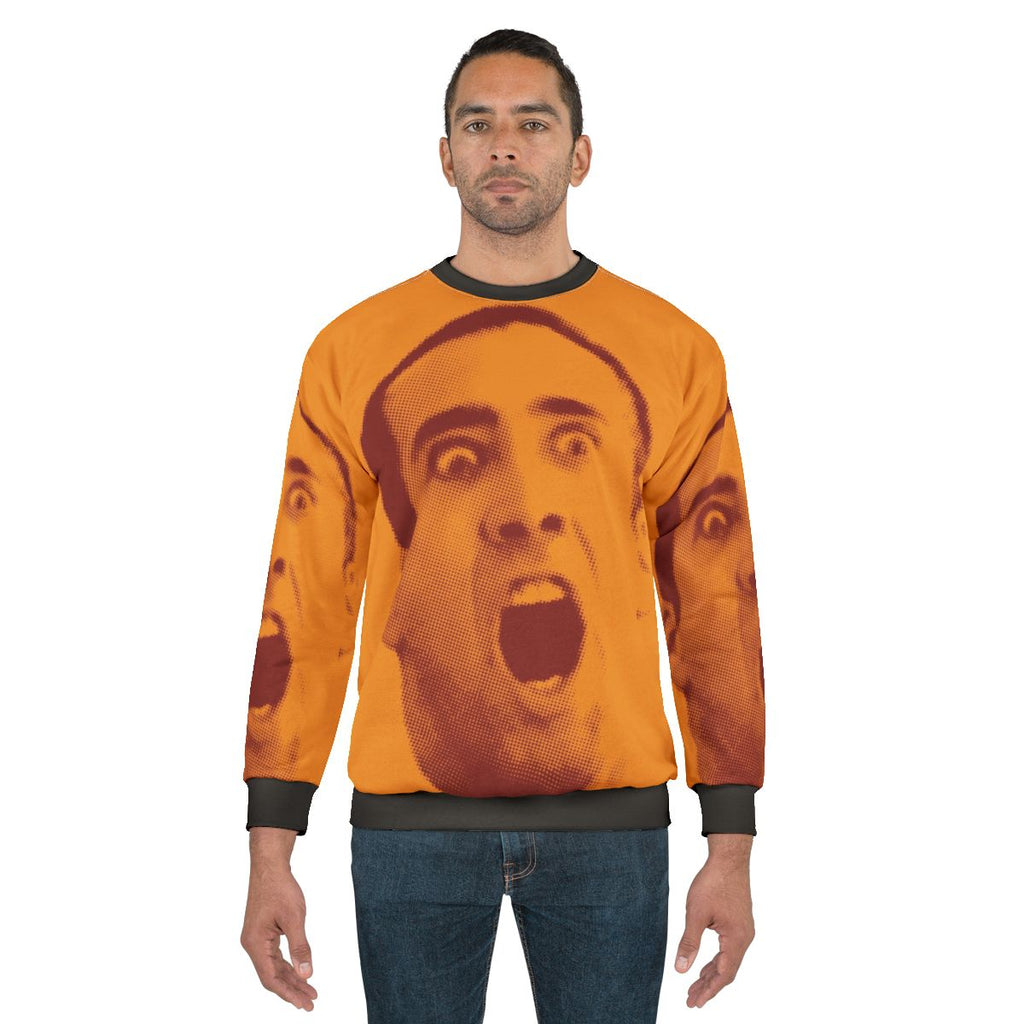 Nicolas Cage pop art design on a gray sweatshirt