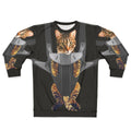 Cute tabby cat in a baby carrier on a sweatshirt