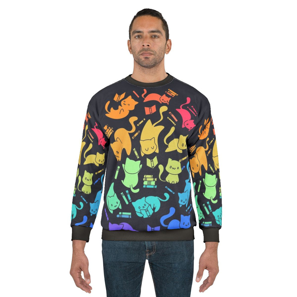 Colorful cats and books sweatshirt with rainbow and kawaii animal print design