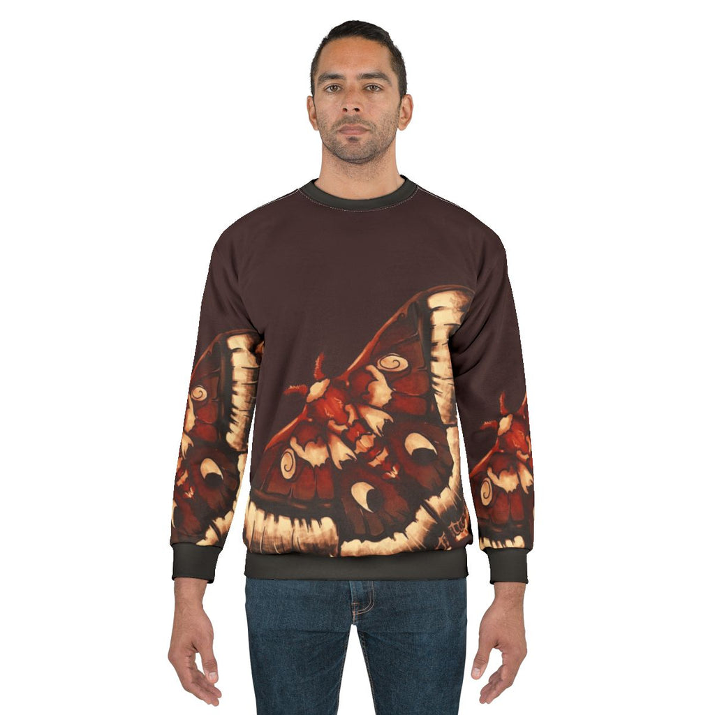 Cecropia moth graphic on a cozy sweatshirt