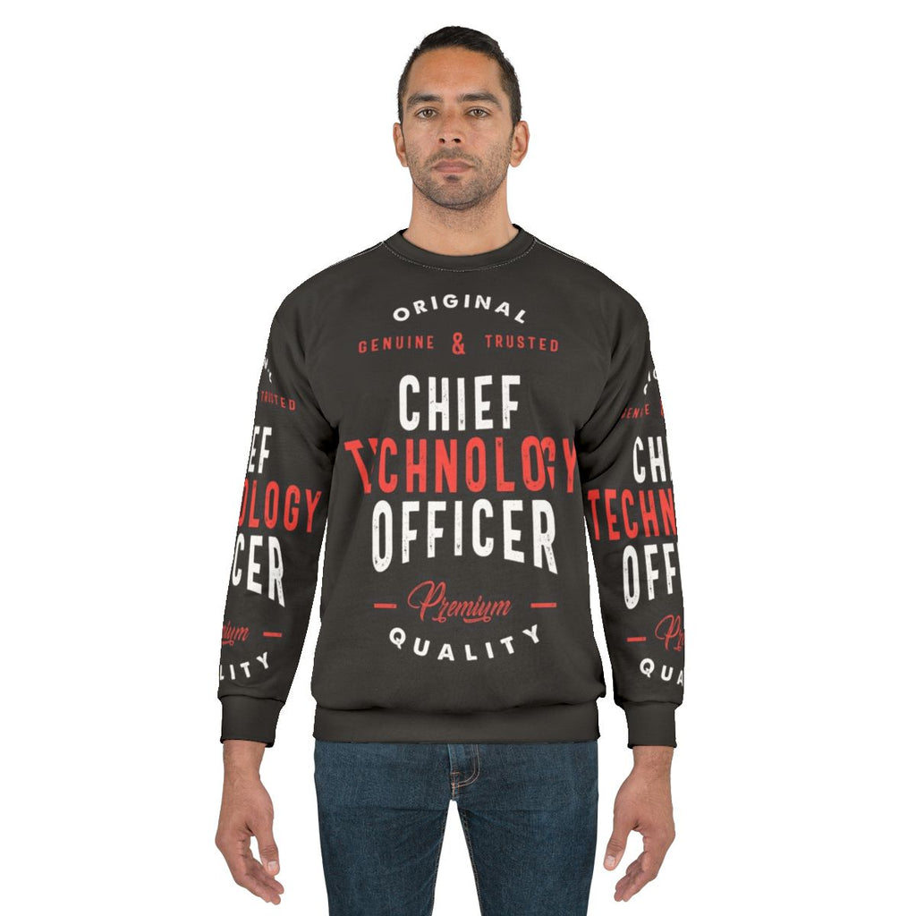 Chief Technology Officer wearing a sweatshirt with "CTO" text