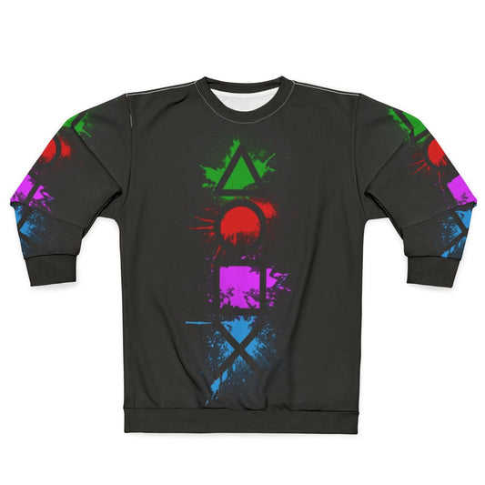 Playstation controller buttons splatter design on a cozy sweatshirt