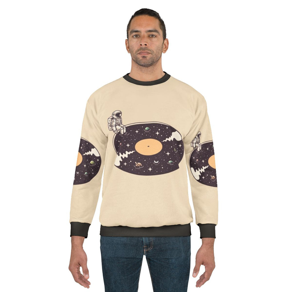 Cosmic Sound Sweatshirt with Astronaut and Space Themed Design