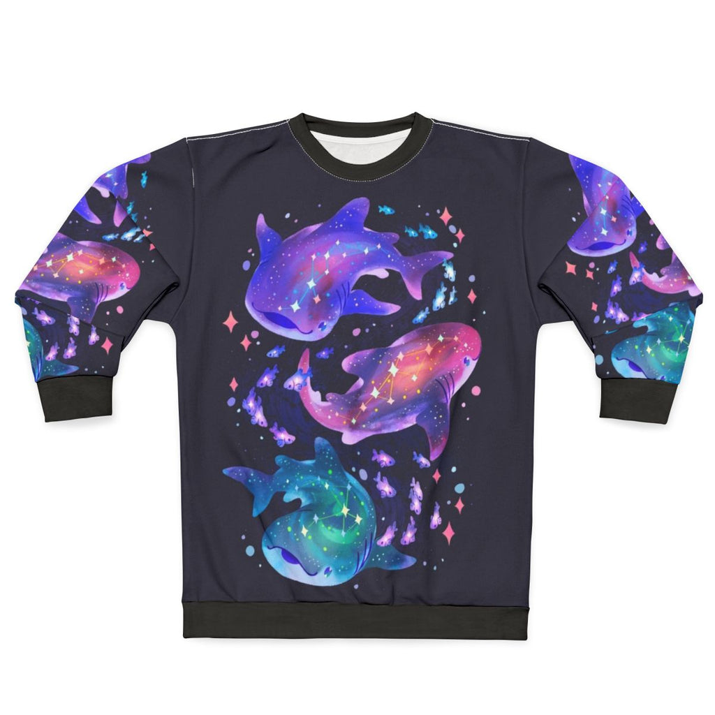 Cosmic whale shark graphic printed on a purple sweatshirt