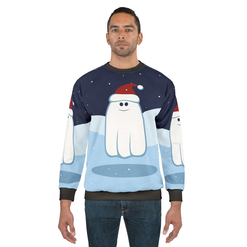 Cute cartoon ghost on a cozy Christmas sweatshirt