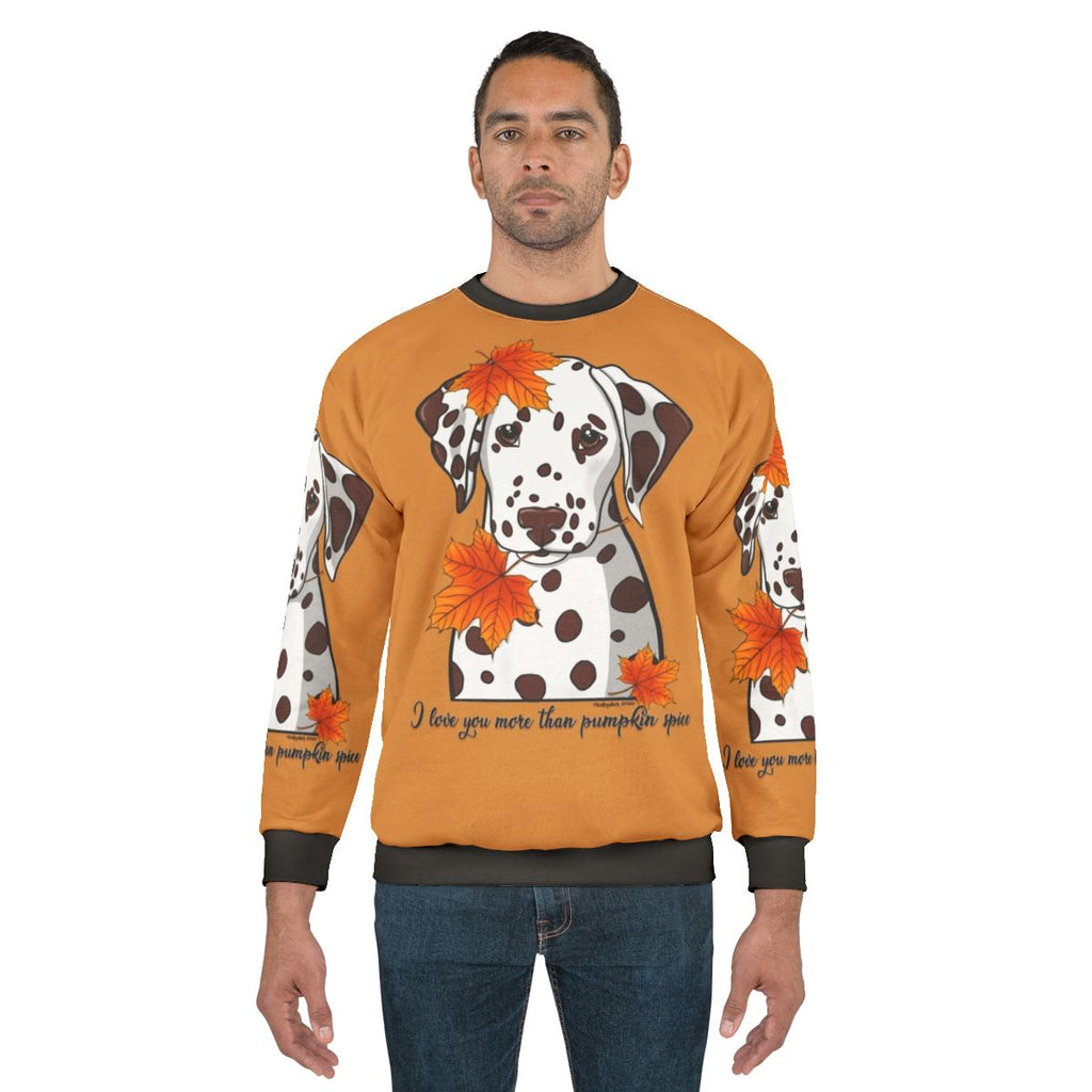 Dalmatian dog wearing a pumpkin spice themed sweatshirt