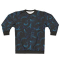 Indigo blue sweatshirt with a design of whales dancing underwater