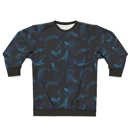 Indigo blue sweatshirt with a design of whales dancing underwater