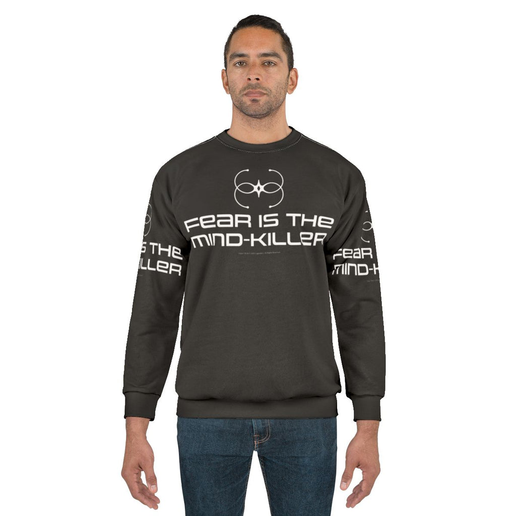 Dune sweatshirt featuring "Fear Is The Mind Killer" quote and sandworm graphics