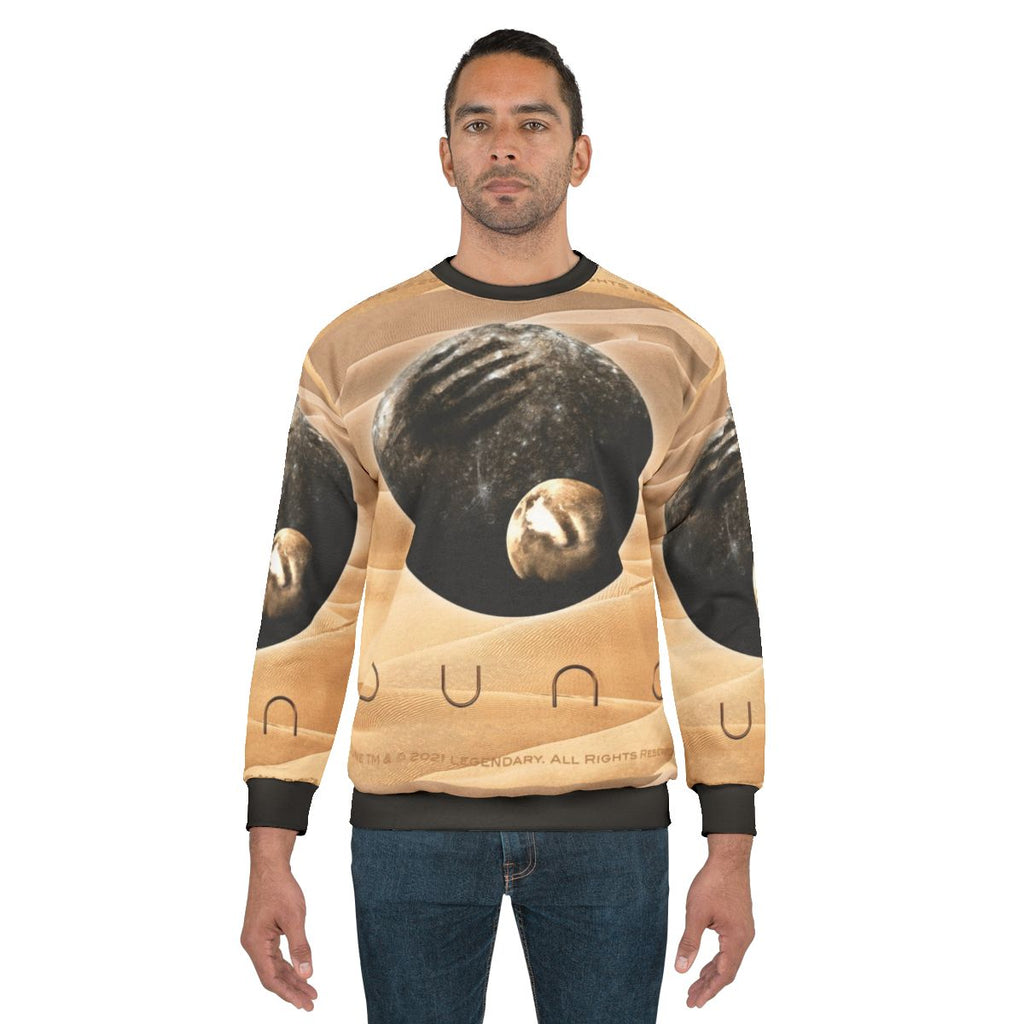 Dune-inspired cinematic sweatshirt featuring planet and moon designs